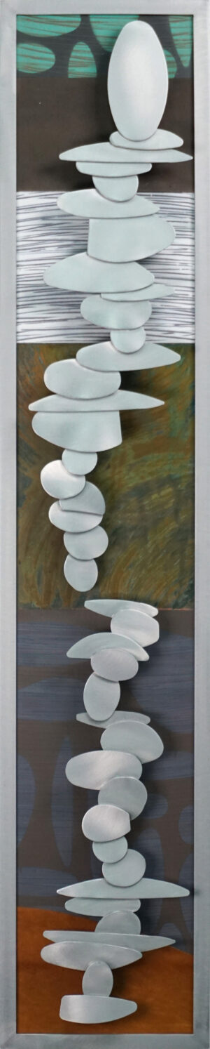 round stacked cairns over water tones