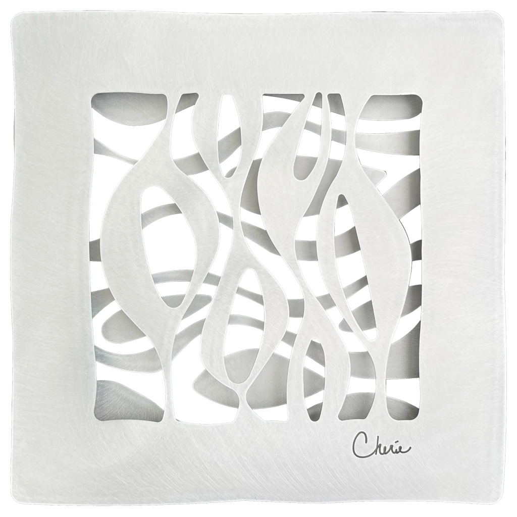 oblong shapes cut out of aluminum and assembled into a 3d wall tile