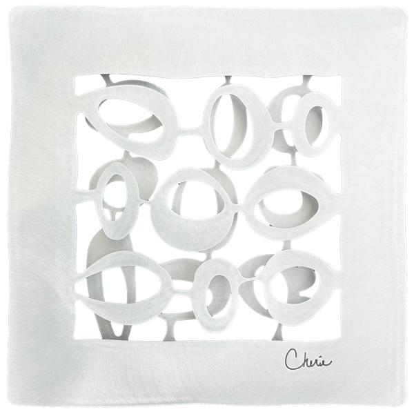 round shapes cut out of aluminum and assembled into a 3d wall tile